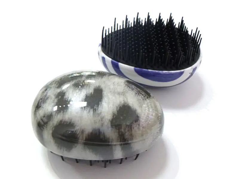 Scalptum Suspendisse Ovum Shaped Travel Comb